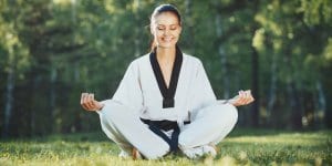 Martial Arts Lessons for Adults in _Cobourg_ _ON_ - Happy Woman Meditated Sitting Background
